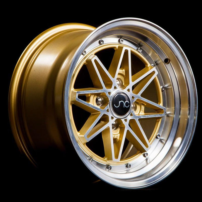 JNC002 | Gold Machined Face | 15x8 | 4x100 | +25mm | CB: 73.1