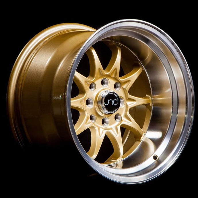 JNC003 | Gold Machined Lip | 15x9 | 4x100/4x114.3 | +0mm | CB: 73.1