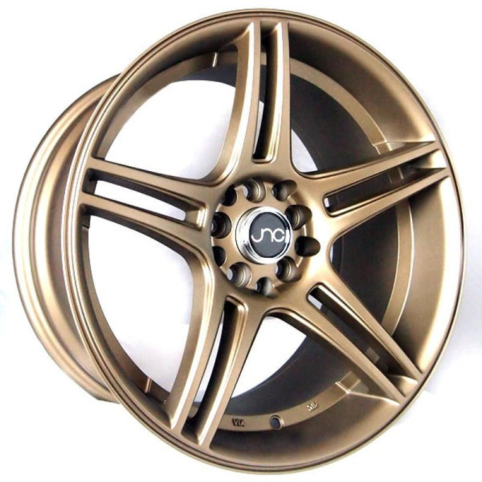JNC029 | Matte Bronze | 16x9 | 4x100/4x114.3 | +25mm | CB: 73.1