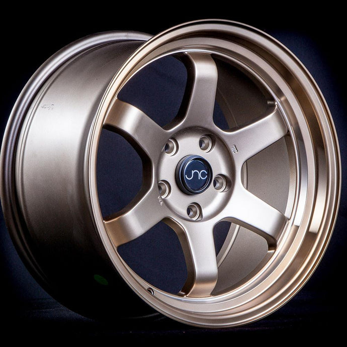 JNC013 | Matte Bronze | 15x8 | 4x100 | +20mm | CB: 73.1