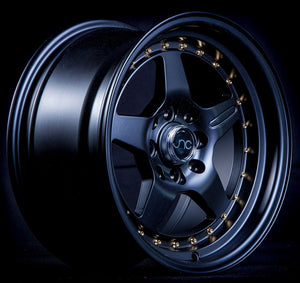 JNC009 | Matte Black Gold Rivets | 15x8 | 4x100/4x114.3 | +25mm | CB: 73.1