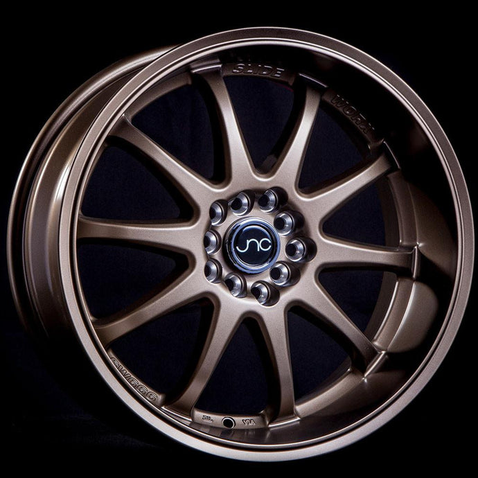 JNC019 | Matte Bronze | 18x9 | 5x100/5x114.3 | +20mm | CB: 73.1