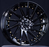 JNC051 | Gloss Black/Gold Rivets | 18x9.5 | 5x100/5x114.3 | +35mm | CB: 73.1
