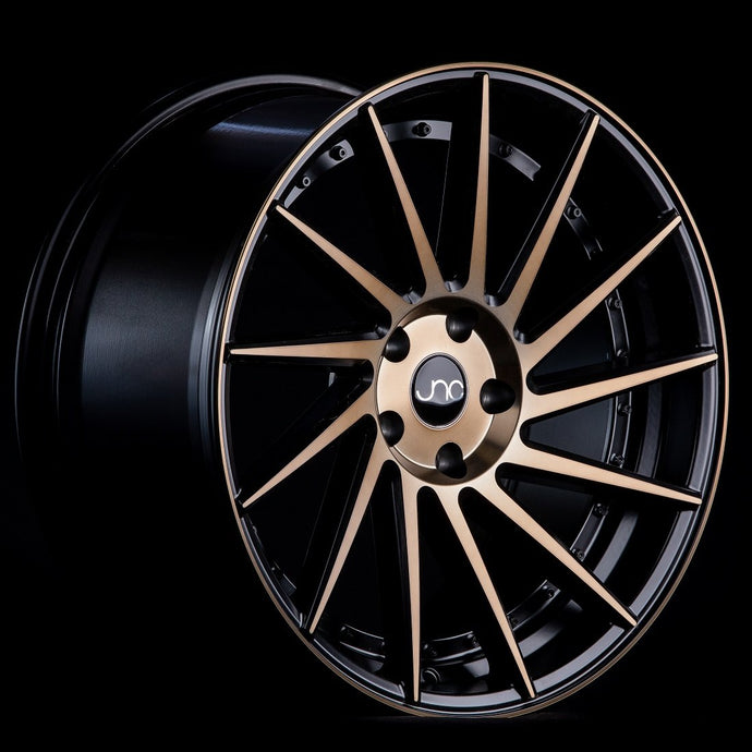 JNC051 | Matte Black Machined Bronze Face | 19x10.5 | 5x100/5x114.3 | +30mm | CB: 73.1