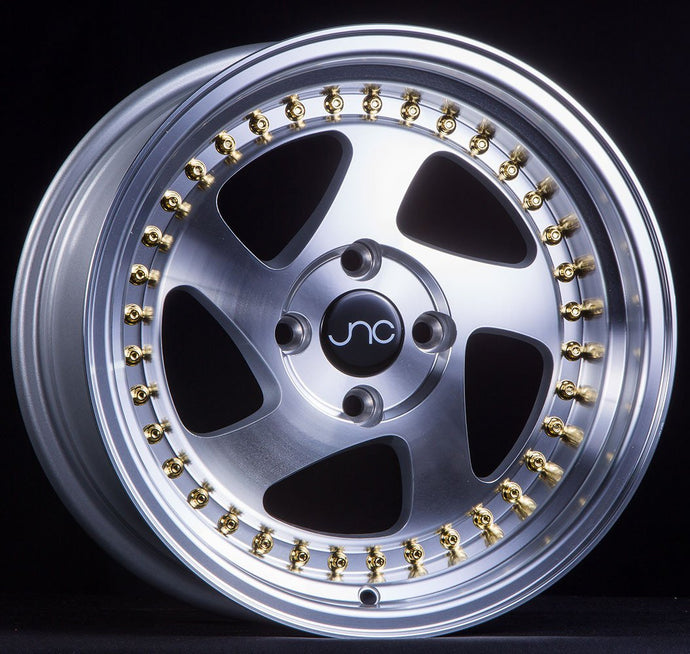JNC034 | Silver Machined Face Gold Rivets | 15x8 | 4x100 | +25mm | CB: 73.1