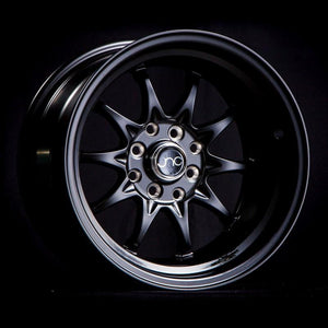 JNC003 | Matte Black | 15x8 | 4x100/4x114.3 | +0mm | CB: 73.1