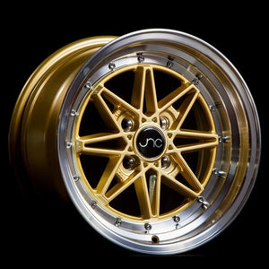 JNC002 | Gold Machined Lip | 15x8 | 4x100 | +25mm | CB: 73.1