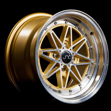 JNC002 | Gold Machined Face | 15x8 | 4x100 | +25mm | CB: 73.1