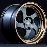 JNC034 | Matte Black Bronze Lip | 17x9 | 5x114.3 | +25mm | CB: 73.1