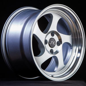 JNC034 | Silver Machined Face | 15x8.25 | 4x100 | +20mm | CB: 73.1