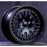 JNC001 | Matte Black w/ Gold Rivets | 15x8 | 4x100 | +25mm | CB: 73.1