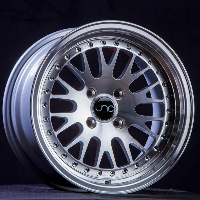 JNC001 | Silver Machined Face | 15x9 | 4x100/4x114.3 | 10+mm | CB: 73.1