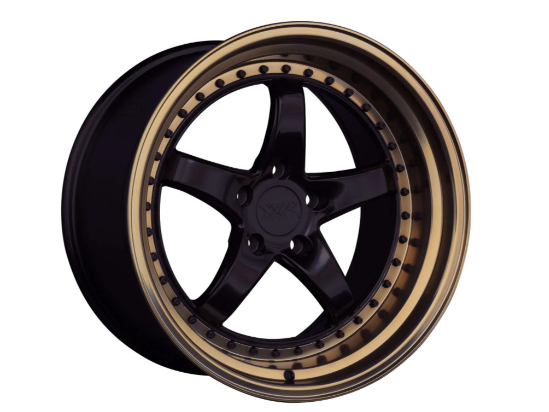565 | Black / Bronze Lip | 18x10.5 | 5x114.3 | +20mm