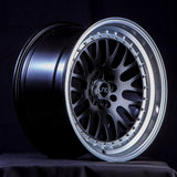 JNC001 | Gloss Black Machine Lip | 17x9 | 5x100/5x114.3 | +20mm | CB: 73.1