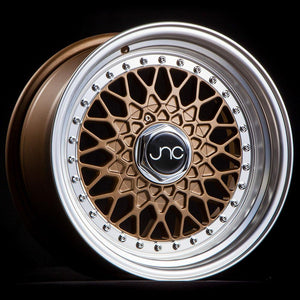 JNC004 | Matte Bronze Machined Lip | 15x8 | 4x100/4x114.3 | +20mm | CB: 73.1