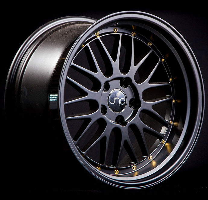 JNC005 | Black Gold Rivets | 18x8 | 4x100/4x114.3 | +34mm | CB: 73.1